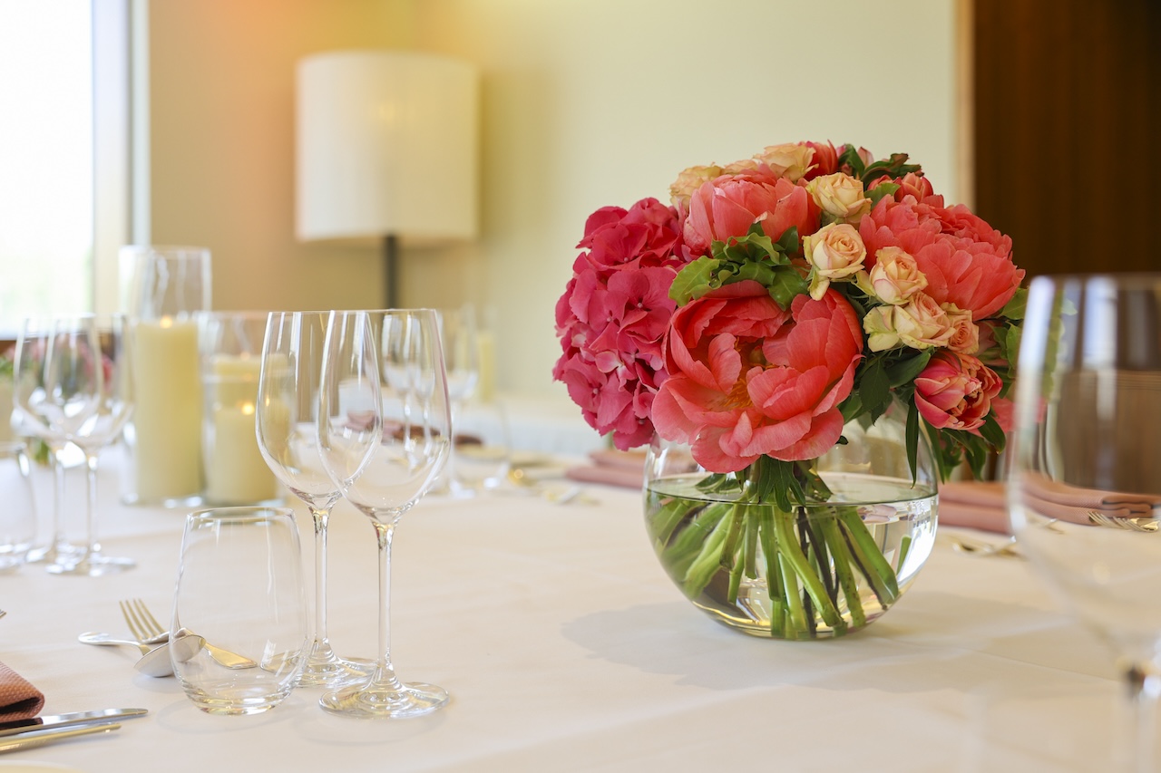 Pink flowers on table